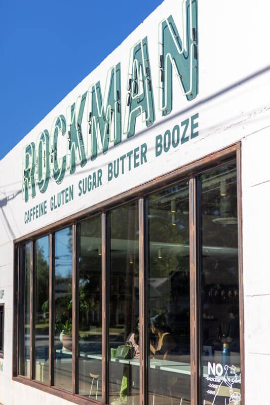 ROCKMAN storefront visible from the sidewalk.